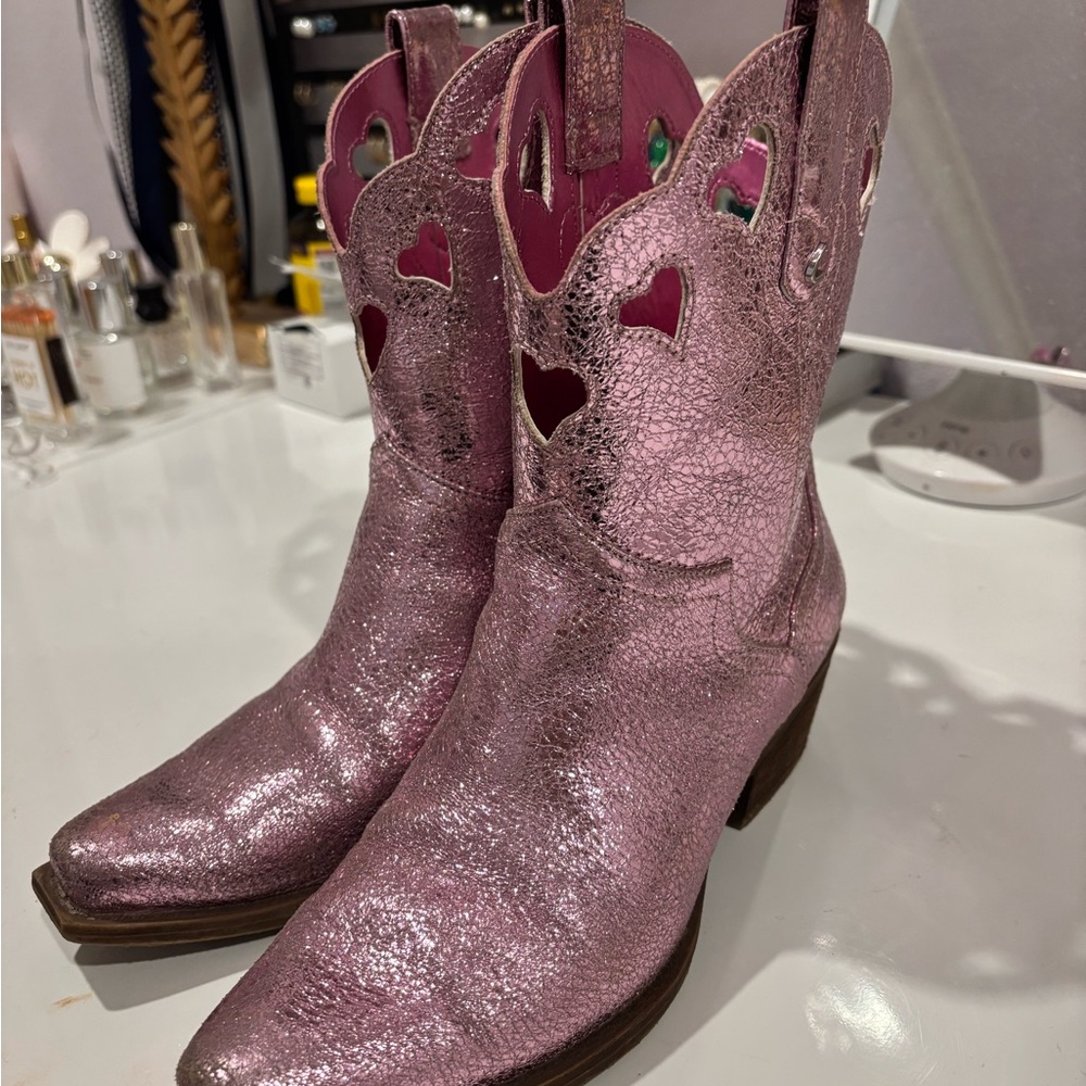 Pink Anthropologie booties with heart cutouts
